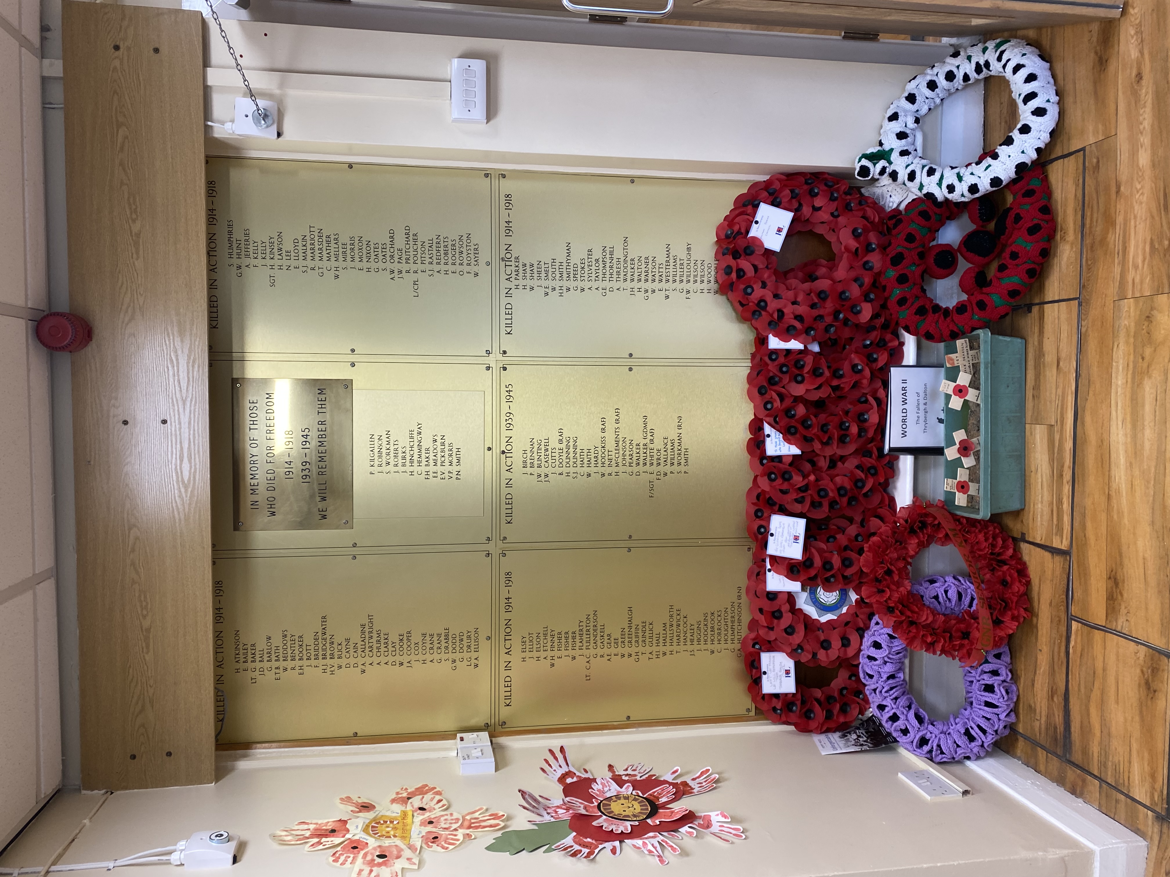 Wreaths at the base of World War 1 and World War 2 memorial.